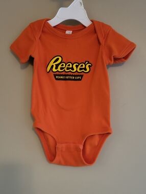 Orange Reese's Peanut Butter Cups onesie/bodysuit